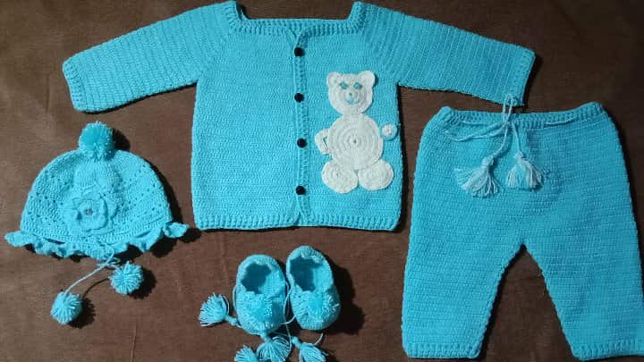 Baby crochet set in soft blush tones